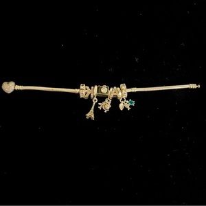 Pandora CZ heart clasp bracelet in size 17 with charms, dangles, clips on it